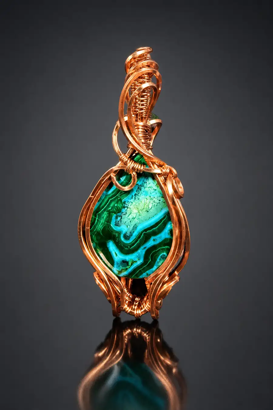 Wire-wrapped malachite and chrysocolla diamond pendant in coiled copper
