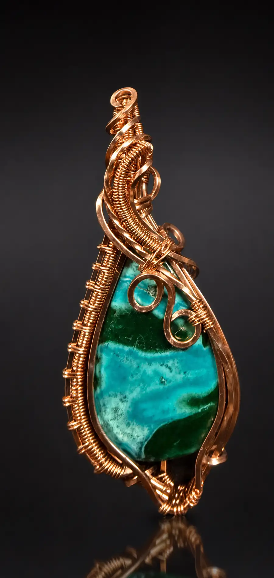 Wire-wrapped banded malachite teardrop pendant with copper S-scrolls